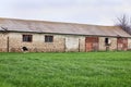 Old warehouse with grass Royalty Free Stock Photo