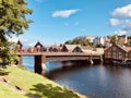Old warehouses and the historic Gamla Bybro bridge in Trondheim