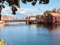 Old warehouses and the historic Gamla Bybro bridge in Trondheim