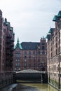 Old warehouses next to a canal in HafenCity, Hamburg, Germany Royalty Free Stock Photo