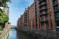 Old warehouses next to a canal in HafenCity, Hamburg, Germany Royalty Free Stock Photo