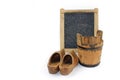 Old washboard, wooden bucket, shoes - white background Royalty Free Stock Photo