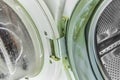 Old washing machine door mounting mechanism, green coating on drum seal