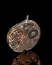 Old watch mechanism on black background Royalty Free Stock Photo