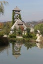 Old watchtower with reflection in a pond