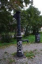 Old water column stands on the street in a residential area of the city. Berlin, Germany Royalty Free Stock Photo