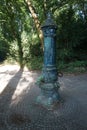 An old water column stands in the Volkspark Humboldthain park. Berlin, Germany Royalty Free Stock Photo