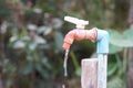 Old water faucet with dripping. Concept. Save water for environment Royalty Free Stock Photo