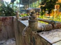 And old water faucet at the garden Royalty Free Stock Photo