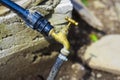 Old water faucet outdoors. Royalty Free Stock Photo