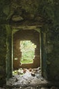 Old water mill bricked up doorway.