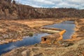 Old water mill built in the riverbed of the Tinto river Royalty Free Stock Photo