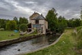 Old water mill on the tuna river running through Royalty Free Stock Photo