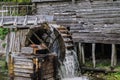 Old water mill, mill wheel on the river Royalty Free Stock Photo