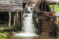 Old water mill, mill wheel on the river Royalty Free Stock Photo