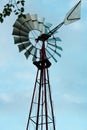 Old water pump windmill in a farm Royalty Free Stock Photo