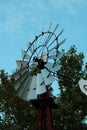 Old water pump windmill in a farm Royalty Free Stock Photo