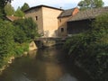 Old water saw with millrace near the river