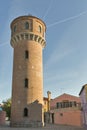 Old water supply tower on Burano island, Italy. Royalty Free Stock Photo