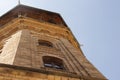 Old water tower building yellow brick wall European architecture Royalty Free Stock Photo