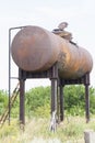 Old water tower, water in the village, rusty construction