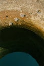 Old water well in the ancient Brihadisvara Temple in Gangaikonda Cholapuram, india.