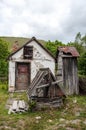 Old water well in the courtyard of a Romanian village