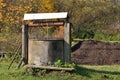 Old water well in the garden Royalty Free Stock Photo