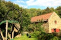 Old water wheel and drive wheel. Royalty Free Stock Photo