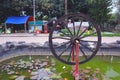 Old water wheel on the pond