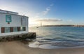 Old waterfront restaurant on sumer day in Lisbon Royalty Free Stock Photo