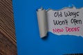 Old Ways Won`t Open New Doors Text written in torn paper Royalty Free Stock Photo