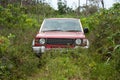An old 4WD car going through the bush in Eua in Tonga Royalty Free Stock Photo
