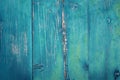 Peeling blue paint layers on old timber boards Royalty Free Stock Photo