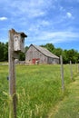 Old weathered birdhouse on a post