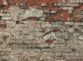 Old weathered brick wall close up. Abstract texture background. Grunge house facade. Horizontal brick tile background. Royalty Free Stock Photo