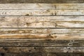 Old natural brown barn wood wall. Wooden textured background pattern.