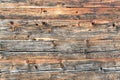 Old natural brown cabin wood wall. Wooden textured background pattern. Royalty Free Stock Photo