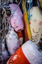 Old weathered bouys attached to a wooden shed on Cape Cod Royalty Free Stock Photo