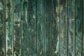 old weathered and cracked boards painted green color for background or texture Royalty Free Stock Photo