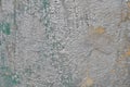 Weathered graffiti paint of silver color on concrete wall Royalty Free Stock Photo