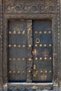 Old weathered door of building in Stone Town, Zanzibar