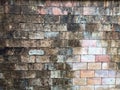 Old weathered exposed and moldy brick wall background,Background of brick wall torn apart by time.