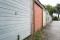 Old and weathered garages seen at a housing estate in the UK. Royalty Free Stock Photo