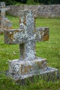 Old weathered gravestone cross Royalty Free Stock Photo