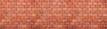 Old and weathered grungy red brick wall texture background in wide panorama format Royalty Free Stock Photo