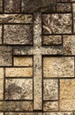 Old Limestone Stone Wall with Cross Background Royalty Free Stock Photo