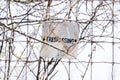 Old and weathered No trespassing sign posted to wire fence, safe Royalty Free Stock Photo