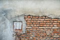 Old weathered red Brick wall