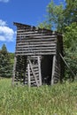 Old weathered rickety corn crib remains standing Royalty Free Stock Photo